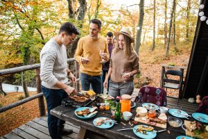 Preparing food outdoors together
